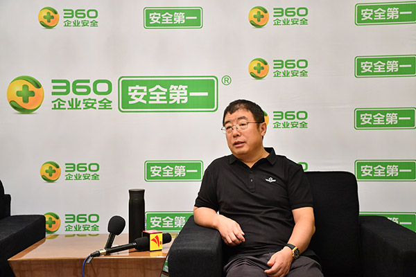 Qi Xiangdong, chairman of 360 Business Security Group, speaks to media in Shenzhen, Guangdong province, on March 30, 2017. (Photo provided to chinadaily.com.cn)