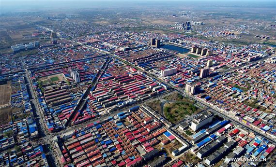 Aerial photo taken on April 1, 2017 shows Xiongxian County, north China's Hebei Province. China announced Saturday it would establish the Xiongan New Area in Hebei Province, as part of measures to advance the coordinated development of the Beijing-Tianjin-Hebei (BTH) region. The New Area, about 100 km southwest of downtown Beijing, will span three counties that sit at the center of the triangular area formed by Beijing, Tianjin and Hebei's provincial capital Shijiazhuang. (Xinhua/Wang Xiao)   