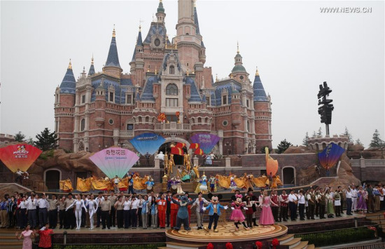 An opening ceremony is held in Shanghai Disney Resort in Shanghai, east China, June 16, 2016. The Shanghai Disney Resort, with a unique blend of Disney magic and Chinese culture, officially opened Thursday. It's the first Disney resort destination on the Chinese mainland and the sixth around the world. (Xinhua/Ren Long) (File photo)