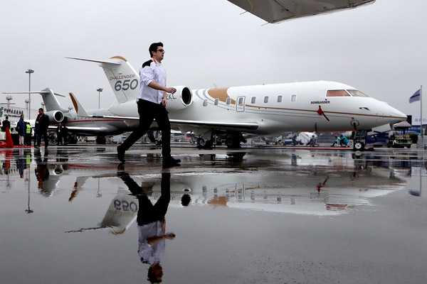 A business jet, made by Bombardier Inc, is on display at the Asian Business Aviation Conference and Exhibition in Shanghai, which opens on Tuesday. (Gao Erqiang/China Daily)