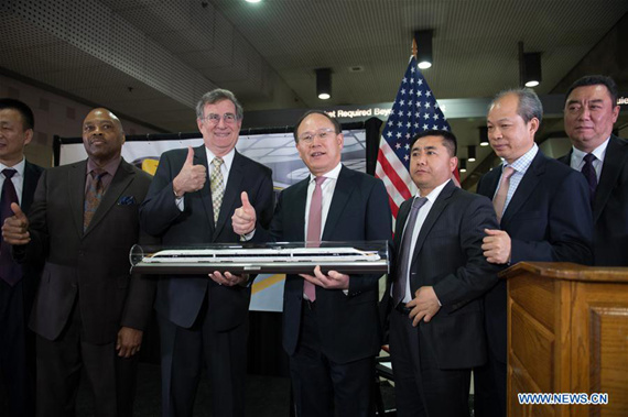 China Railway Rolling Stock Corporation (CRRC)President Xi Guohua (4th R) attends the signing ceremony in Los Angeles, the United States, April 12, 2017. LA Metro on Wednesday signed a 647 million-U.S.-dollar contract to purchase 282 rail cars from CRRC. (Xinhua/Yang Lei)
