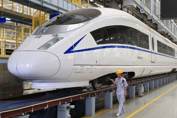 A high-speed train manufactured by China Railway Rolling Stock Corp arrives at a maintenance warehouse in Xi'an, Shaanxi province, in July, 2016. (Photo/Xinhua)