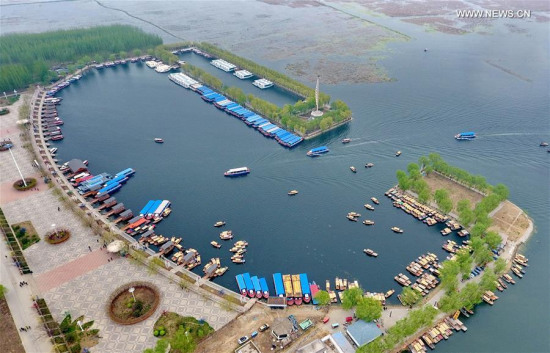 Photo taken on April 9, 2017 shows a dock in Baiyangdian, one of the largest freshwater wetlands in north China, in Anxin County, north China's Hebei Province. China announced the plan for Xiongan New Area officially on April 1, 2017. The new area will span Xiongxian, Rongcheng and Anxin counties in Hebei Province, eventually covering 2,000 square kilometers. (Xinhua/Mou Yu)