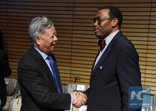 Asian Infrastructure Investment Bank(AIIB) President Jin Liqun (L) attends the Development Committee Meeting during the World Bank and International Monetary Fund (IMF) annual Spring Meetings in Washington D.C., capital of the United States, April 16, 2016. (Xinhua/Yin Bogu)