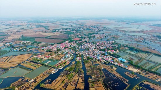 Photo taken on April 9, 2017 shows a village in Baiyangdian, one of the largest freshwater wetlands in north China, in Anxin County, north China's Hebei Province. China announced the plan for Xiongan New Area officially on April 1, 2017. The new area will span Xiongxian, Rongcheng and Anxin counties in Hebei Province, eventually covering 2,000 square kilometers. (Xinhua/Mou Yu)