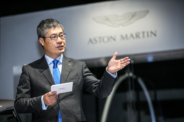 Michael Peng, president of Aston Martin China, delivers a speech at the Shanghai auto show in April. (Photo provided to chinadaily.com.cn)