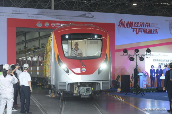 Photo taken on May 15, 2017 shows a new subway train made for Pakistan Lahore Orange Line Project at the CRRC Zhuzhou Locomotive Co., Ltd. in Zhuzhou, central China's Hunan Province. (Xinhua/Long Hongtao)