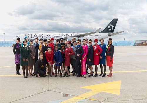 Flight attendants pose for photos in front of a Star Alliance aircraft. (Photo/Courtesy of Star Alliance)