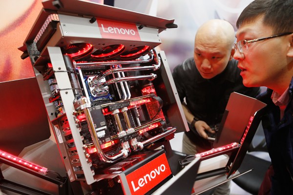 A new Lenovo computer is on show at an innovation summit held in Xi'an, capital of Shaanxi province. ZHANG JIE / FOR CHINA DAILY