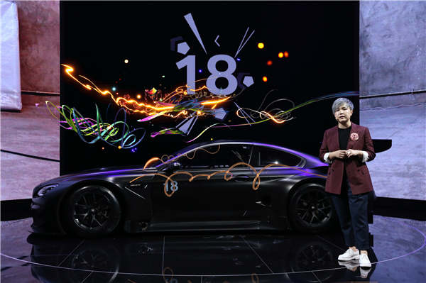Multimedia artist Cao Fei with the art car she designed using augmented and virtual reality. (Photo provided to China Daily)