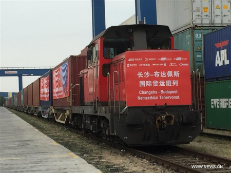 A new freight train arrives at the Budapest Intermodal Logistic Center in Budapest, Hungary, on June 16, 2017. This freight train departed from southern Chinese city of Changsha on May 27, carrying 41 containers of electronic products, shoes and apparel, fiber optic cable, hardware and machinery parts made in China. (Xinhua/Yang Yongqian) 