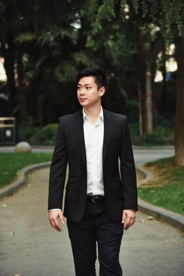 Justin Lao, founder of K.U.G., a professional Cantonese-training institution. (Photo provided to China Daily)