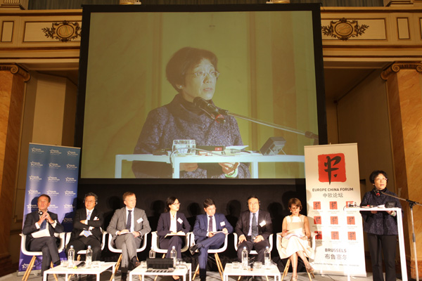 Head of the Mission of the People's Republic of China to the European Union Yang Yanyijoined a group of Chinese experts in Brussels on Tuesday at the Europe-China Forum where they urged the EU to start free-trade talks with China. (Photo by Fu Jing/China Daily)