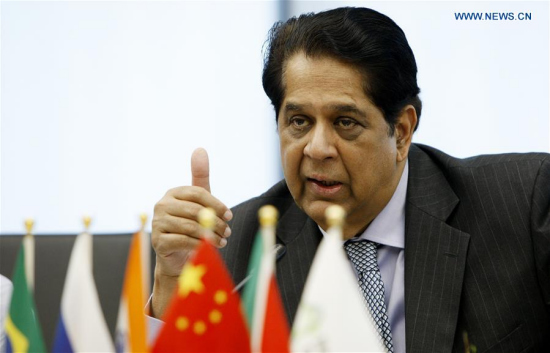 President of the BRICS New Development Bank K.V. Kamath answers questions during a press conference in Shanghai, east China, July 6, 2017. (Xinhua/Fang Zhe)