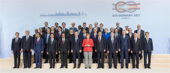 Chinese President Xi Jinping and other leaders attending the 12th Summit of the Group of 20 (G20) major economies pose for a group photo in Hamburg, Germany, July 7, 2017. (Xinhua/Li Xueren)