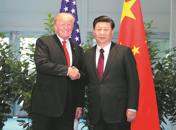 Chinese President Xi Jinping (R) meets with his U.S. counterpart Donald Trump to discuss bilateral ties and global hot-spot issues on the sidelines of a Group of 20 (G20) summit, in Hamburg, Germany, July 8, 2017. (Xinhua/Yao Dawei)