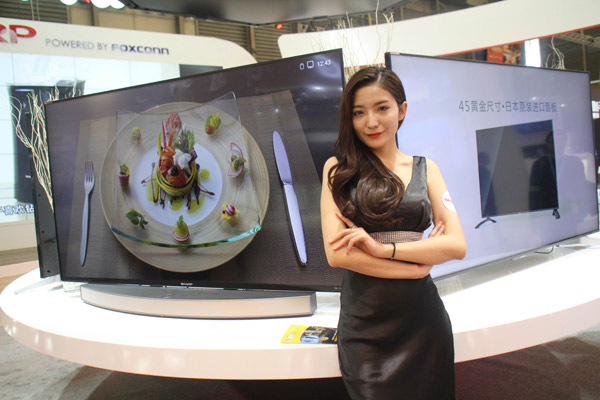 Smart TVs are displayed at the 2017 Appliance & Electronics World Expo in Shanghai. (Photo provided to China Daily)