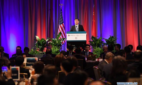 Chinese Vice Premier Wang Yang addresses a business luncheon ahead of the first China-US Comprehensive Economic Dialogue in Washington, the United States, on July 18, 2017. (Xinhua/Yin Bogu)
