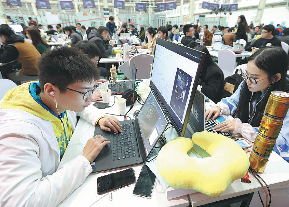 Programmers at a skills competition in Wuhan, Hubei province. (Photo by Song Zhentao/For China Daily)