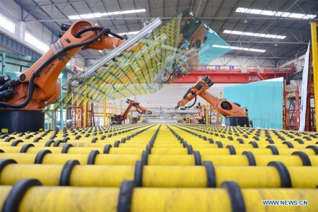 Photo taken on March 26, 2017 shows a glass production line of an enterprise in Shahe City, north China's Hebei Province. China's gross domestic product expanded 6.9 percent year on year in the first half of the year to about 38.15 trillion yuan (5.62 trillion U.S. dollars), data from the National Bureau of Statistics (NBS) showed Monday. (Xinhua/Zhu Xudong)