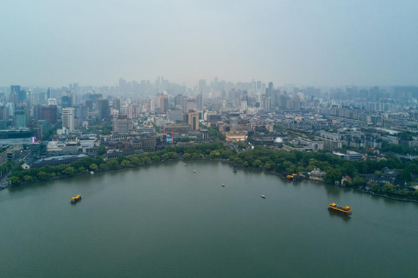 Residential buildings around West Lake in Hangzhou, Zhejiang province on on May 1, 2017. ��Photo/Xinhua��