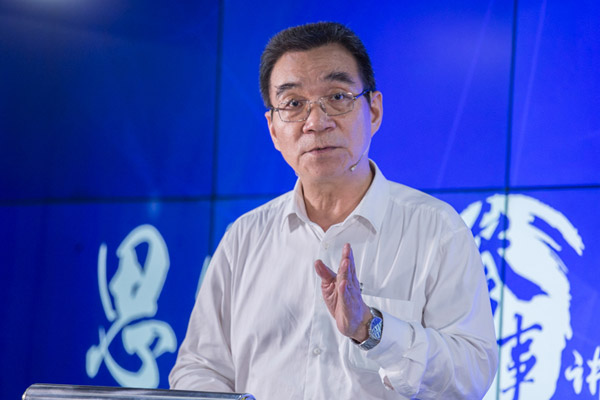 Former World Bank chief economist Justin Yifu Lin delivers a speech in Beijing on August 11. (Photo/Xinhua)