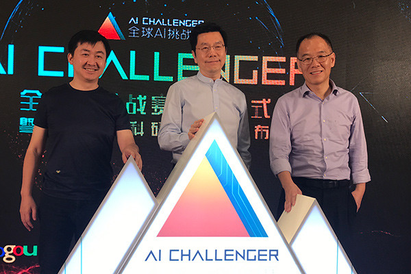 Wang Xiaochuan, founder and CEO of Sougou, Lee Kai-fu, founder and CEO of Sinovation Ventures, and Zhang Hongjiang, head of Technical Strategy Research Center with ByteDance, pose for pictures at the launch ceremony of AI Challenger contest, in Beijing, Aug 14, 2017. (Photo provided to chinadaily.com.cn)