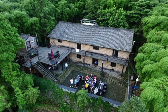 Guests at the Prodigy Outdoor Base, a hostel in Moganshan of Zhejiang province. (A Yuan/for China Daily)