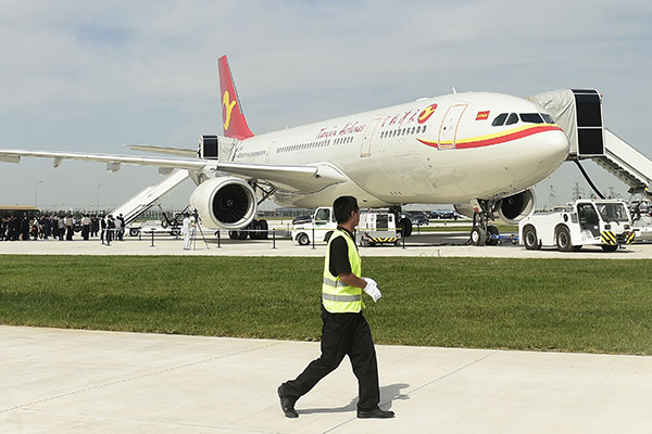 The first European and Chinese made wide-body A330 aircraft is delivered to Tianjin Airlines on Wednesday. (Jia Lei/for China Daily)