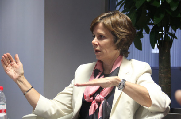 Amy Barzdukas, vice-president and chief marketing officer of Polycom, explains the company's strategy during an interview in Beijing. (Photo provided to China Daily)