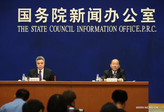 Ning Jizhe (R), head of the National Bureau of Statistics, speaks at the press conference held by the State Council Information Office in Beijing, capital of China, Oct. 10, 2017. (Xinhua/Cai Yang)