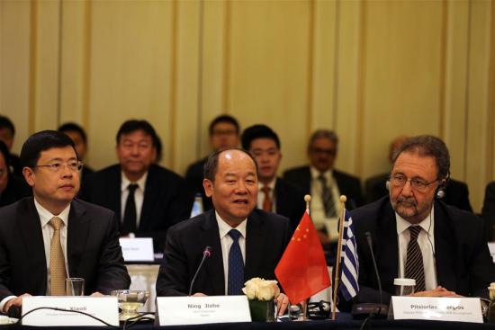 Chinese Ambassador to Greece Zou Xiaoli (L, Front), China's National Development and Reform Commission (NDRC) vice head Ning Jizhe (C, Front) and Greek Deputy Minister of Economy and Development Stergios Pitsiorlas (R, Front) attend the second meeting of the working groups under the 2017-2019 Greece-China Action Plan in Athens, capital of Greece, on Nov. 2, 2017. (Xinhua/Marios Lolos)