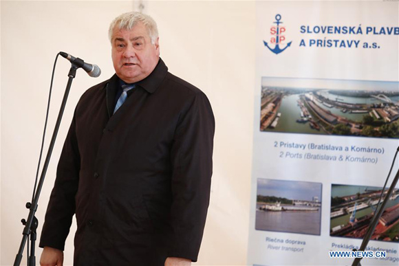 Slovak Transport and Construction Minister Arpad Ersek addresses a welcome ceremony of the arrival of a freight train from China to the Port of Bratislava, capital of Slovakia, on Nov. 13, 2017. (Xinhua/Andrej Klizan)
