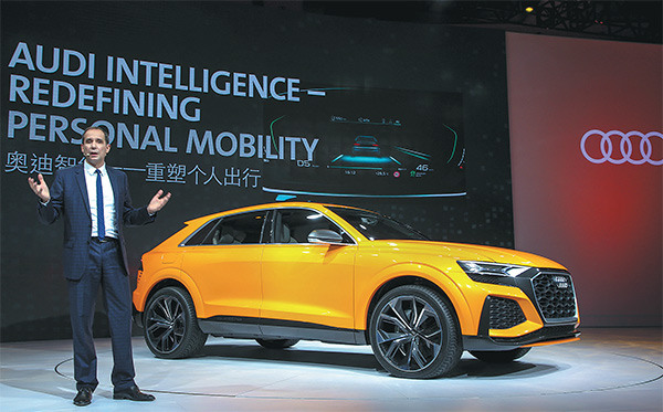 Audi China chief Joachim Wedler presents the Q8 concept at a news conference ahead of the Guangzhou auto show.(Photo provided to China Daily)