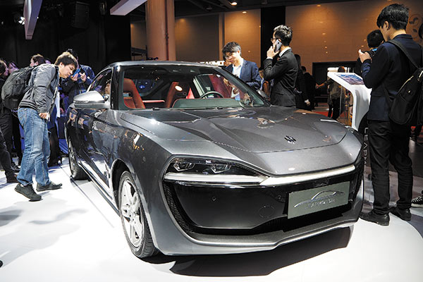 Leap Motor, founded in December 2015, unveils its sub-compact full electric coupe on Nov 10 in Hangzhou, Zhejiang province.(Photo by Hao Yan/China Daily)