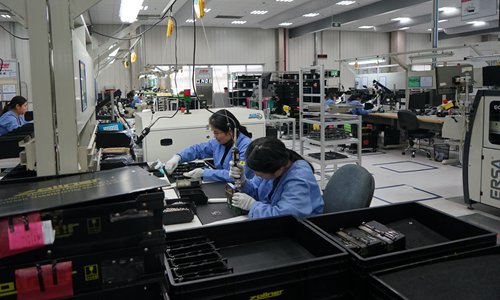 Employees work at the Zollner Electronic (Taicang) Co. Ltd, a world-leading mechatronics service provider in Taicang, East China's Jiangsu Province. (Photo: Qi Xijia/GT)