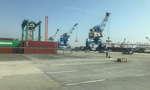 Nansha port, located in South China's Guangdong Province, handles hundreds of containers every day. (Photo: Chen Qingqing/GT)