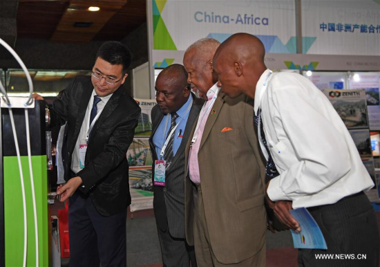 A man of a Chinese firm introduces products during the first China-Africa Industrial Capacity Cooperation Exposition in Nairobi, Kenya, Dec. 12, 2017. (Xinhua/Chen Cheng)