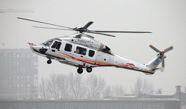 The AC352 helicopter, jointly developed by Airbus and the State-owned Aviation Industry Corporation of China, fills a gap in the Chinese market for advanced medium-sized aircraft. (Photo by Liu Yang/For China Daily)