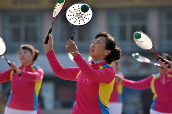 Retirees and homemakers practise taichi at a playground in Chaohu, Anhui province. Investment products aimed at senior citizens seeking stable yields over the long term are becoming popular in China. [Photo by Li Yuanbo/For China Daily]