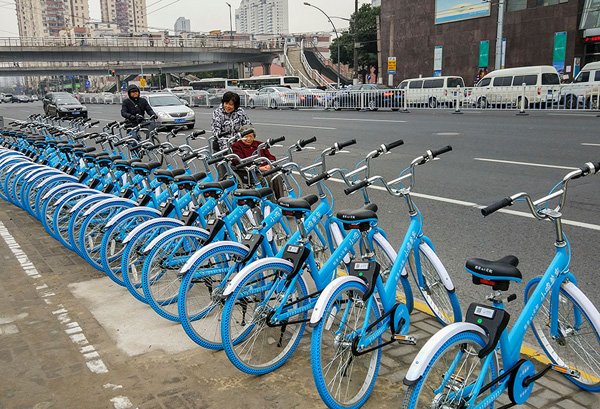 Bike-sharing company Xiaoming is under attack by consumers for delays in refunding deposits. WANG GANG/FOR CHINA DAILY