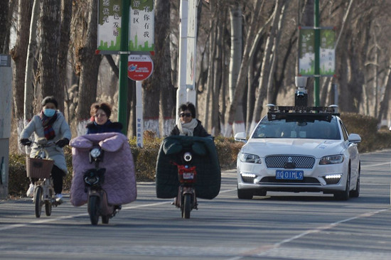 A self-driving vehicle produced by Baidu Inc undergoes a road test in Xiongan New Area, Hebei province, on Dec 20, 2017. (Provided to China Daily)