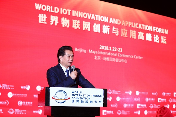 He Xuming, executive chairman of the World Internet of Things Convention, gives a speech at the World IoT Innovation and Application Forum held in Beijing on Jan 22, 2018. (Photo provided to chinadaily.com.cn)