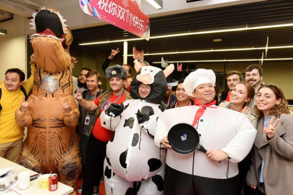 A group of overseas employees at Alibaba Group Holding Ltd in Hangzhou, Zhejiang province, where the company is headquartered. They play an important role in helping improve communication with the company's international consumers. (Photo provided to China Daily)