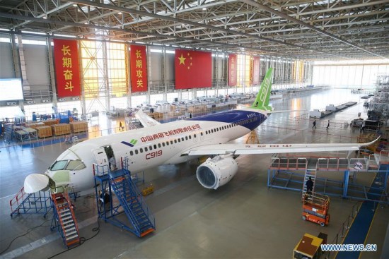 China's large passenger aircraft, the C919, is seen at the assembly line in Shanghai, east China, Feb. 13, 2018. (Xinhua/Ding Ting)