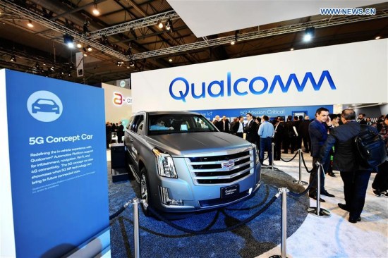 People visit the Qualcomm 5G Concept Car on the first day of the 2018 Mobile World Congress (MWC) in Barcelona, Spain, on Feb. 26, 2018. (Xinhua/Guo Qiuda)