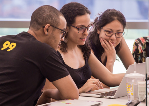 Employees of Didi Chuxing, China's largest ride-hailing company, at work at their offices in Sao Paulo, Brazil. (Photo provided to China Daily)