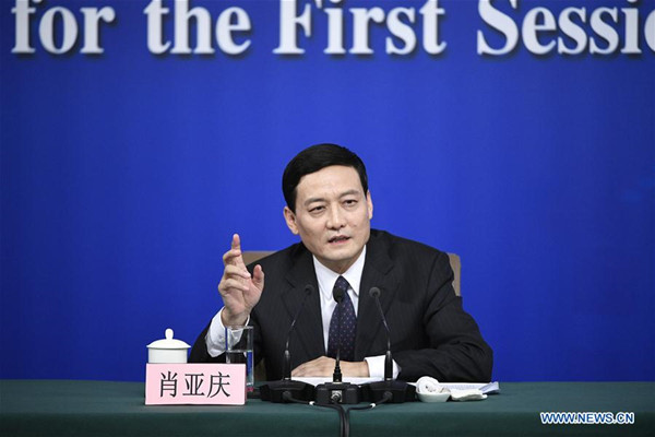 Xiao Yaqing, head of the State-owned Assets Supervision and Administration Commission (SASAC), answers questions at a press conference on reform and development of state-owned enterprises on the sidelines of the first session of the 13th National People's Congress in Beijing, capital of China, March 10, 2018. (Xinhua/Wang Peng)
