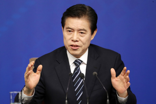Minister of Commerce Zhong Shan speaks at a news conference during the ongoing 13th National People's Congress on Sunday. (Photo by Feng Yongbin/China Daily)