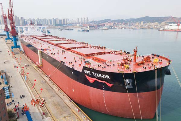 Qingdao Beihai Shipbuilding Heavy Industry Co, a subsidiary of Wuchang Shipbuilding Industry Group Co Ltd, delivered Ore Tianjina very large ore carrierto its client on Thursday.(Photo by Zhang Jingang/for China Daily)